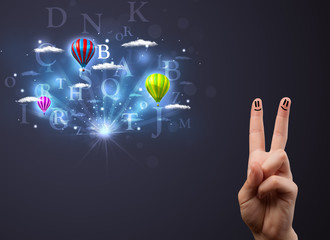 Happy smiley fingers looking at hot air balloons in the cloudy s