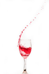 Red wine splash with drops