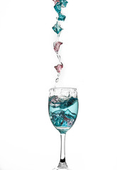 Water splashing in a glass, isolated on white