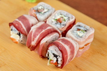 Sushi roll with bacon