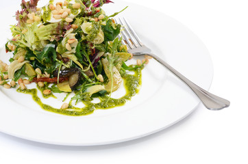 Salad with rucola and pine nuts