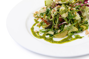 Salad with rucola and pine nuts
