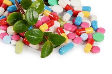 Tablets and pills with a plant
