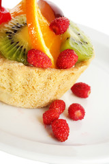sweet cake with fruits on plate