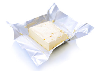 Tasty butter isolated on white