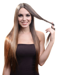 Obraz premium Beautiful young woman with long hair isolated on white