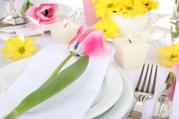 Table setting with spring flowers close up
