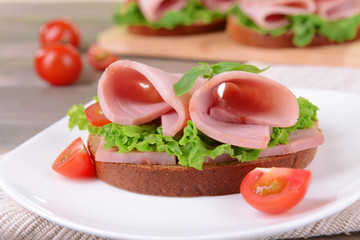 Delicious sandwich with lettuce and ham