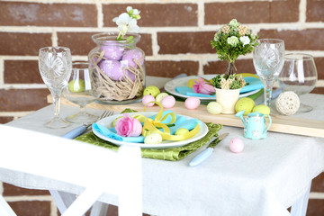 Beautiful holiday Easter table setting, on bright background