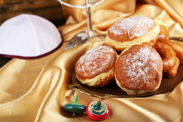 Festive composition for Hanukkah on cloth close-up