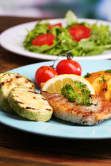 Grilled steak, grilled vegetables and fresh green salad