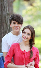 Fototapeta premium Beautiful young couple in park