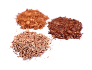 Crushed eyeshadow isolated on white