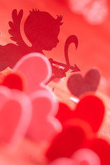 Hearts on red background