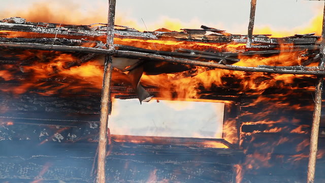 Fire Consumes A Building. Fire Damage.