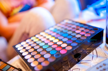 close-up of colorful make-up palette and eyeshadow set