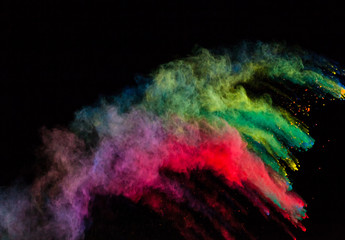 launched colorful powder over black