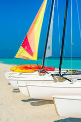 Colorful sailing boats on a tropical cuban beach
