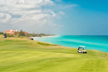 Meubelstickers Golf course at Varadero beach in Cuba © kmiragaya