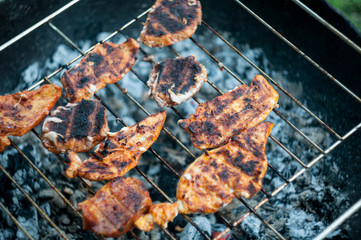 burned meat on the grill