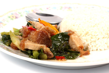 Stir fried kale Crispy pork with steamed rice