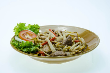 Fried rice noodles topped isolated on white background