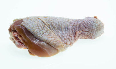 raw chicken legs on a white background