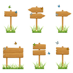 Set of wooden signs in grass