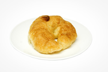 fresh croissant on plate