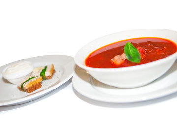 Borsch, red beetroot soup in white plate, menu restaurant