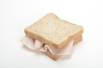 Fototapeta na wymiar Sandwich de pechuga de pavo en fiambre
