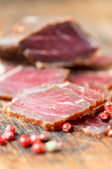 Obraz premium Slices of cured meet table