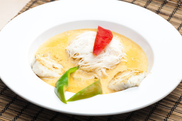 Thai curry with cod and rice noodles