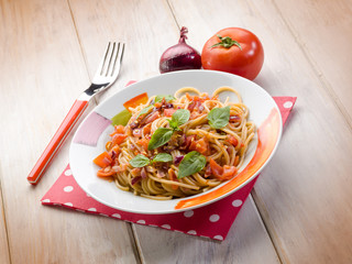 spaghetti with fresh tomato red onion and hot chili pepper