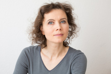 Obraz premium Romantic woman looking into camera with smile