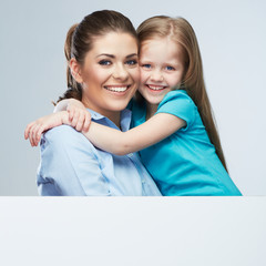 Mother and daughter embrace. Business woman with kid girl. Iso