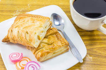 corn pie and cup of coffee