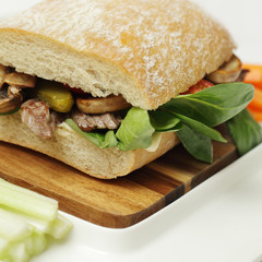 Fresh ciabatta with mushrooms, beef and corn lettuce, healthy fo