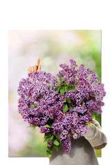 Holding A Heart-Shaped Bunch Of Lilac