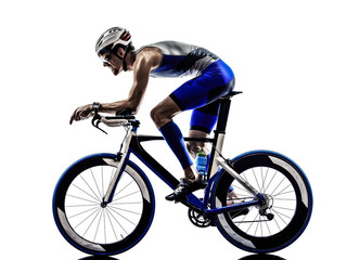 man triathlon iron man athlete cyclists bicycling - obrazy, fototapety, plakaty