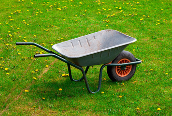 garden-wheelbarrow on green grass