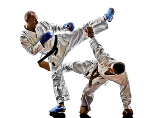 Fototapeta na wymiar karate men teenager students fighters fighting protections
