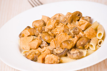 Penne pasta with mushroom and chicken breast