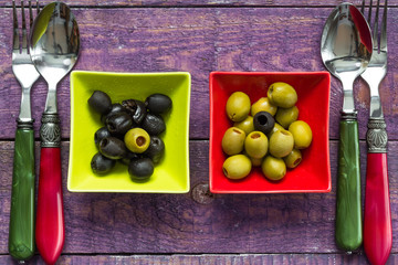 Colorful fruits olives bowls wooden table