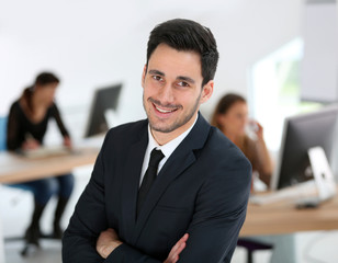 Portrait of young businessman in office