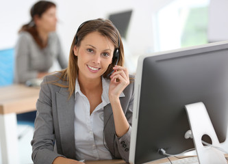 Smiling customer service representative at work