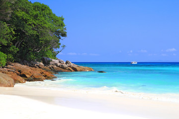 Blue sea and white sandy beach