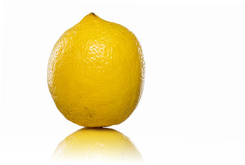 yellow lemon standing with reflection, isolated on white