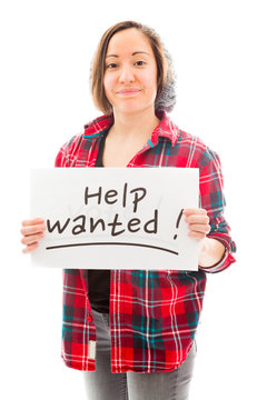 Young woman showing help wanted sign