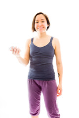 Fototapeta premium Young woman holding on mobile phone and smiling